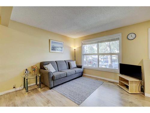 106 Woodborough Terrace Sw, Calgary, AB - Indoor Photo Showing Living Room