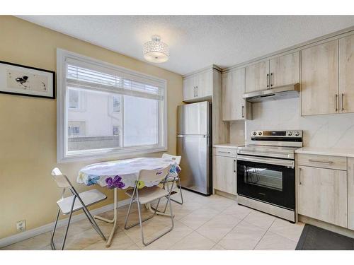 106 Woodborough Terrace Sw, Calgary, AB - Indoor Photo Showing Kitchen With Stainless Steel Kitchen