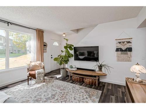 132-999 Canyon Meadows Drive Sw, Calgary, AB - Indoor Photo Showing Living Room