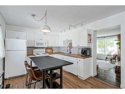 132-999 Canyon Meadows Drive SW Calgary, AB T2W 2S6