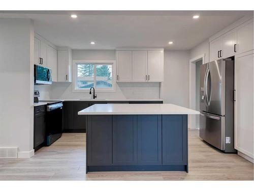 63 Fenton Road Se, Calgary, AB - Indoor Photo Showing Kitchen With Upgraded Kitchen