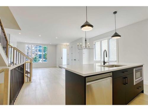 3-1927 27 Street Sw, Calgary, AB - Indoor Photo Showing Kitchen With Double Sink