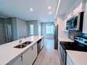 623 Nolanlake Villas Nw, Calgary, AB  - Indoor Photo Showing Kitchen With Double Sink With Upgraded Kitchen 