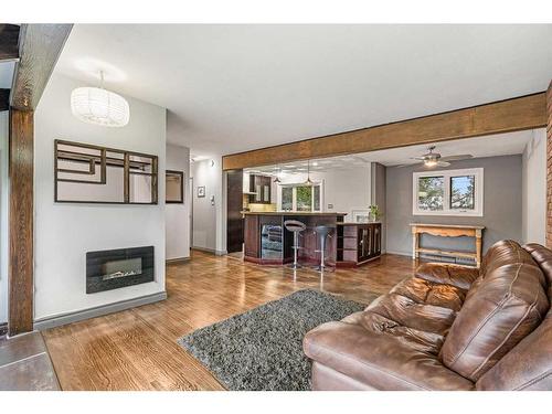 4832 Worcester Drive Sw, Calgary, AB - Indoor Photo Showing Living Room With Fireplace