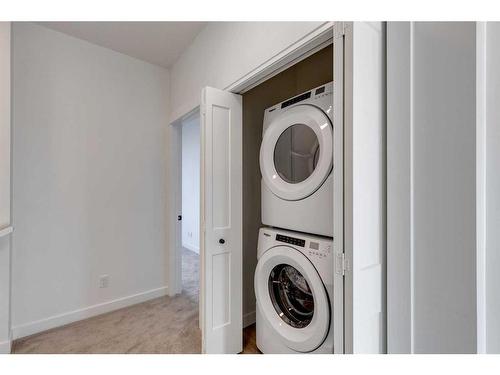 68 Silverton Glen Green Sw, Calgary, AB - Indoor Photo Showing Laundry Room