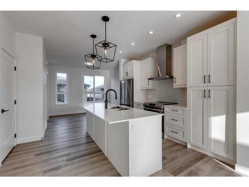 68 Silverton Glen Green Sw, Calgary, AB - Indoor Photo Showing Kitchen With Double Sink With Upgraded Kitchen