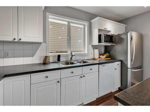 91 Covepark Rise Ne, Calgary, AB - Indoor Photo Showing Kitchen With Double Sink