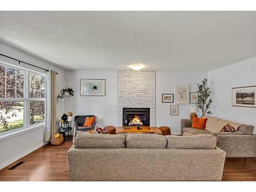 91 Covepark Rise Ne, Calgary, AB - Indoor Photo Showing Living Room With Fireplace