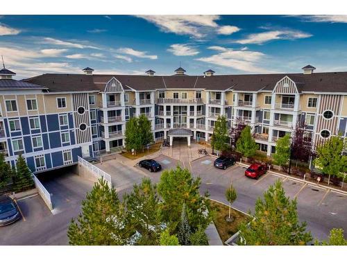 202-130 Auburn Meadows View Se, Calgary, AB - Outdoor With Balcony With Facade