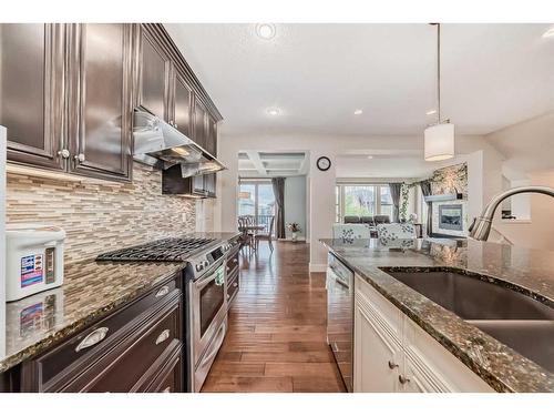 483 Evergreen Circle Sw, Calgary, AB - Indoor Photo Showing Kitchen With Double Sink With Upgraded Kitchen