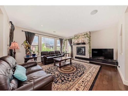 483 Evergreen Circle Sw, Calgary, AB - Indoor Photo Showing Living Room With Fireplace