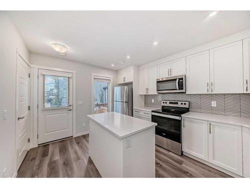 118-260 Rowley Way Nw, Calgary, AB - Indoor Photo Showing Kitchen