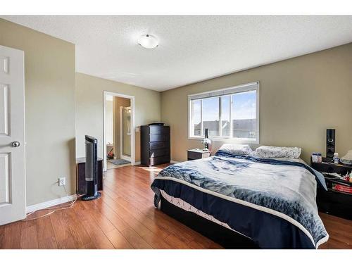 24 Copperstone Place Se, Calgary, AB - Indoor Photo Showing Bedroom