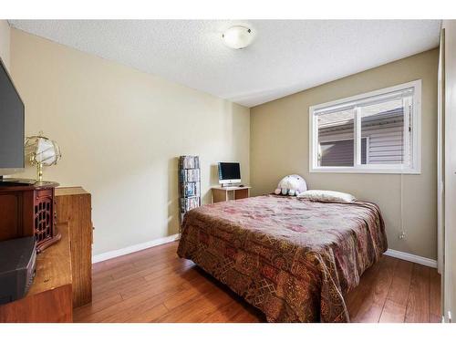 24 Copperstone Place Se, Calgary, AB - Indoor Photo Showing Bedroom