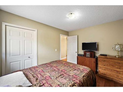 24 Copperstone Place Se, Calgary, AB - Indoor Photo Showing Bedroom