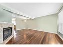 141 Woodborough Terrace Sw, Calgary, AB  - Indoor With Fireplace 