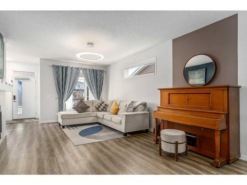 853 West Lakeview Drive, Chestermere, AB - Indoor Photo Showing Living Room With Fireplace