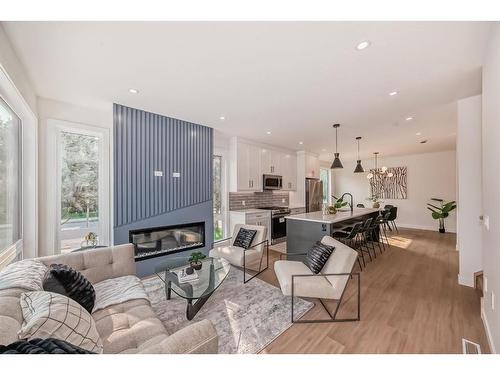 1401 19 Avenue Nw, Calgary, AB - Indoor Photo Showing Living Room With Fireplace