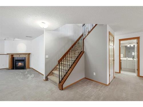 6530 Sierra Morena Boulevard Sw, Calgary, AB - Indoor With Fireplace