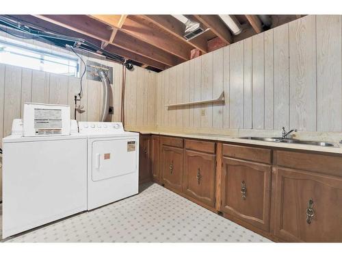 135 Rundleview Drive Ne, Calgary, AB - Indoor Photo Showing Laundry Room