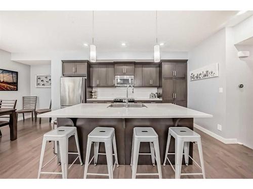 2-310 12 Avenue Ne, Calgary, AB - Indoor Photo Showing Kitchen With Stainless Steel Kitchen With Upgraded Kitchen