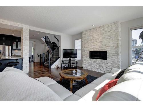 81 Auburn Meadows Crescent Se, Calgary, AB - Indoor Photo Showing Living Room With Fireplace