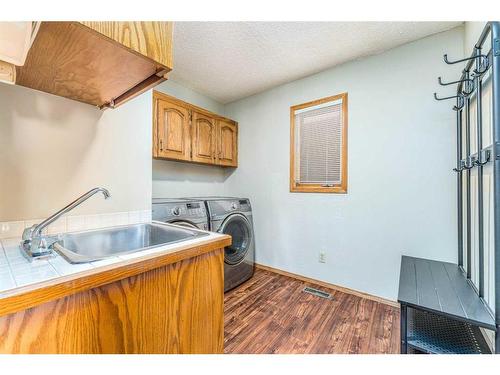 60 Patterson Hill Sw, Calgary, AB - Indoor Photo Showing Laundry Room