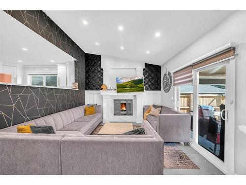 7030 Temple Drive Ne, Calgary, AB - Indoor With Fireplace