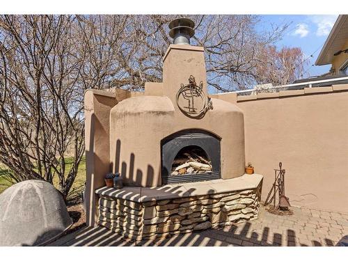 1115 16A Street Nw, Calgary, AB - Outdoor With Fireplace