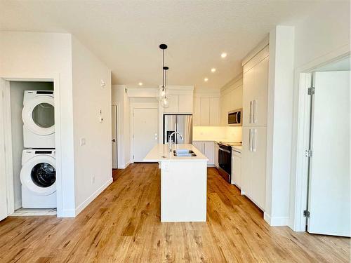 2220-395 Skyview Parkway Ne, Calgary, AB - Indoor Photo Showing Kitchen With Double Sink