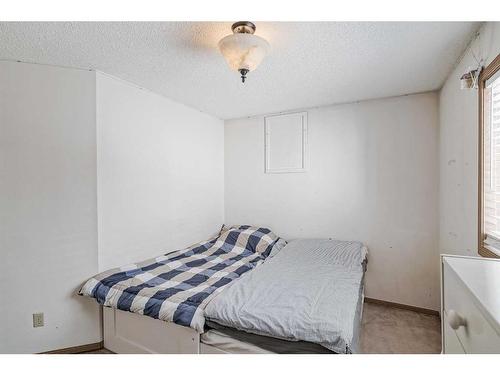 56 Laguna Close Ne, Calgary, AB - Indoor Photo Showing Bedroom