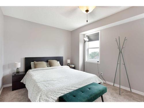 90 Country Hills Cove Nw, Calgary, AB - Indoor Photo Showing Bedroom