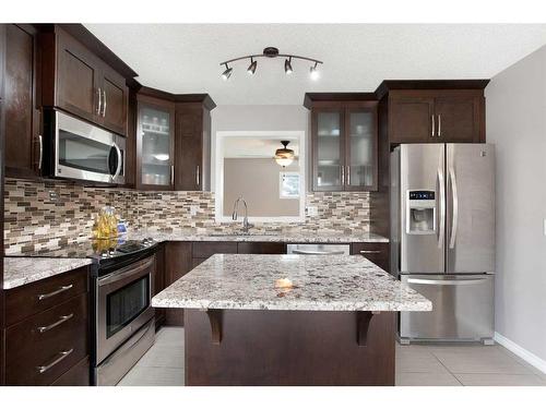 90 Country Hills Cove Nw, Calgary, AB - Indoor Photo Showing Kitchen With Upgraded Kitchen