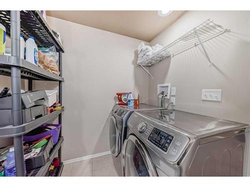 129 Elgin Meadows View Se, Calgary, AB - Indoor Photo Showing Laundry Room