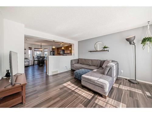 129 Elgin Meadows View Se, Calgary, AB - Indoor Photo Showing Living Room