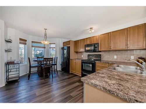 129 Elgin Meadows View Se, Calgary, AB - Indoor Photo Showing Kitchen With Double Sink