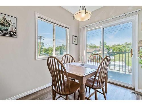 201-16 Poplar Avenue, Okotoks, AB - Indoor Photo Showing Dining Room