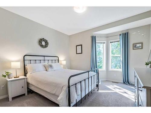 201-16 Poplar Avenue, Okotoks, AB - Indoor Photo Showing Bedroom