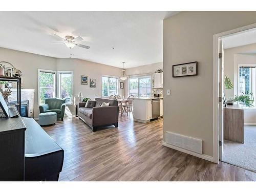 201-16 Poplar Avenue, Okotoks, AB - Indoor Photo Showing Living Room