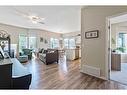 201-16 Poplar Avenue, Okotoks, AB  - Indoor Photo Showing Living Room 