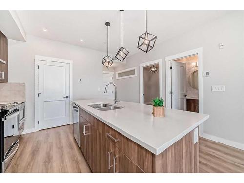 5212-200 Seton Circle Se, Calgary, AB - Indoor Photo Showing Kitchen With Double Sink With Upgraded Kitchen