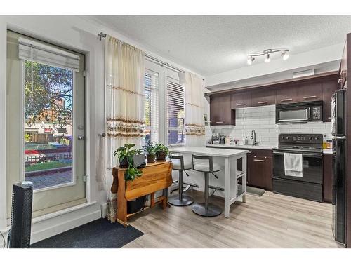 104-323 18 Avenue Sw, Calgary, AB - Indoor Photo Showing Kitchen