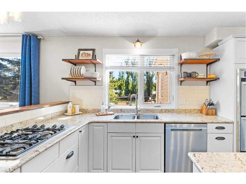 5826 Imperial Drive, Olds, AB - Indoor Photo Showing Kitchen With Double Sink