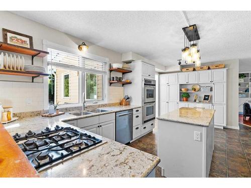 5826 Imperial Drive, Olds, AB - Indoor Photo Showing Kitchen With Double Sink