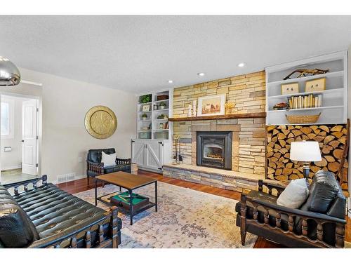 5826 Imperial Drive, Olds, AB - Indoor Photo Showing Living Room With Fireplace