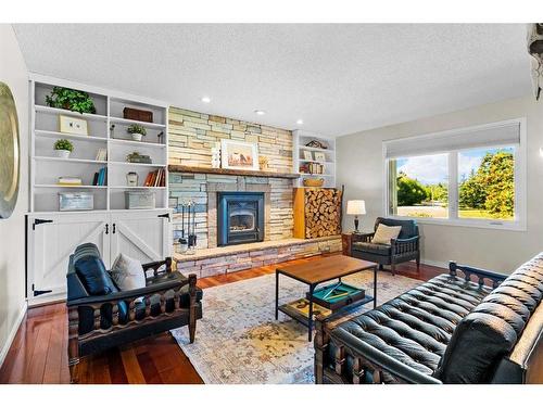 5826 Imperial Drive, Olds, AB - Indoor Photo Showing Living Room With Fireplace