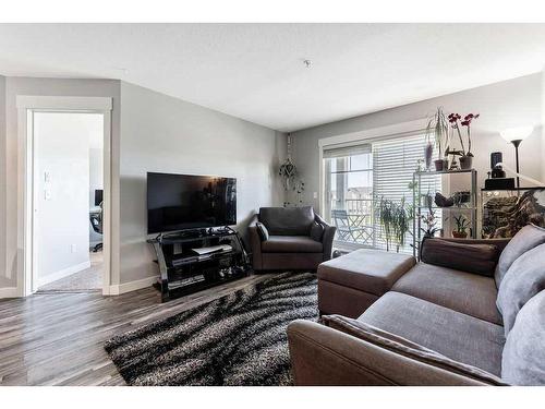 4306-155 Skyview Ranch Way Ne, Calgary, AB - Indoor Photo Showing Living Room