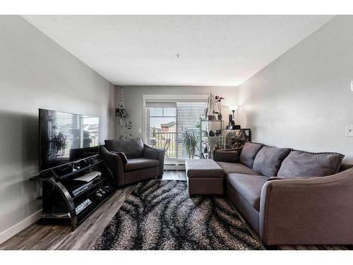 4306-155 Skyview Ranch Way Ne, Calgary, AB - Indoor Photo Showing Living Room