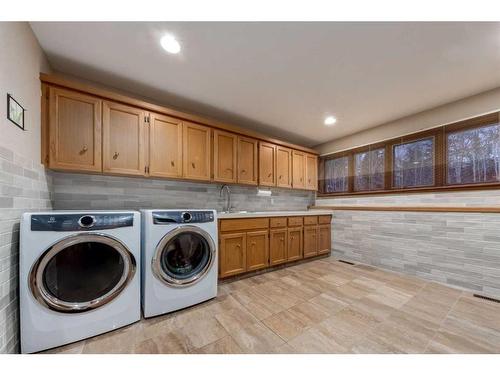 63 Pinebrook Way Sw, Rural Rocky View County, AB - Indoor Photo Showing Laundry Room