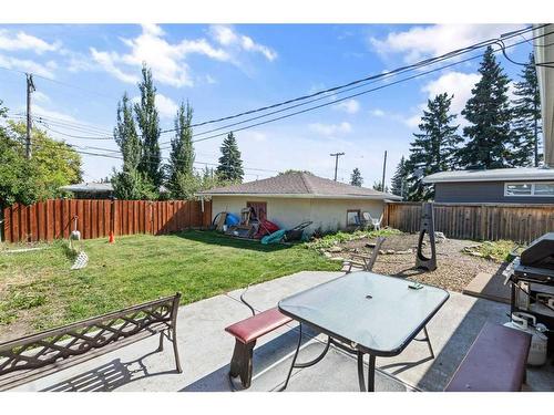 68 Sackville Drive Sw, Calgary, AB - Outdoor With Deck Patio Veranda